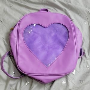 Used Purple Ita Heart Backpack